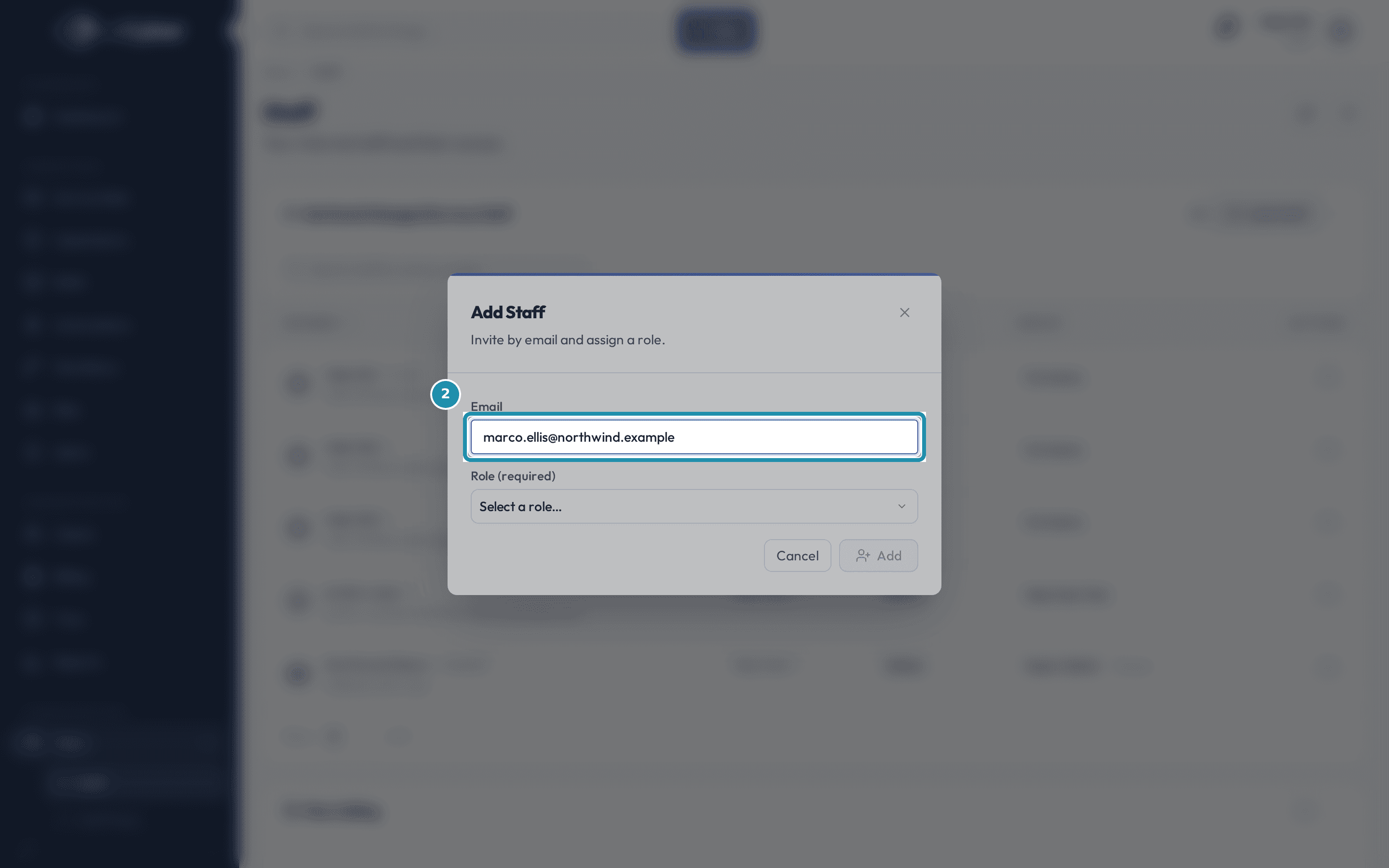 The Add Staff dialog with the Email field filled in as marco.ellis@northwind.example, Role still reading Select a role..., and the Add button greyed out.